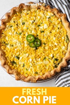 an overhead view of a quiche with cheese and jalapenos