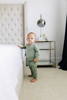 Good things come in pairs and our tops + bottoms are no exception. They’re made from our signature silky-soft material for a stretchy, comfy fit with functional buttons and fold-over waistband for room to grow (or to wear high-waisted). Say goodbye to socks that slip right off with built-in footies (on the newborn size only) to keep those tiny toes warm without the fuss. Unbelievably sweet mixing & matching approved. Sizes: *Newborn size only includes footies + fold over wrist cuffs Newborn-3 Mo Loungewear Pants With Buttons, Solid Color Pants With Buttons For Loungewear, Stretch Tops With Button Closure For Loungewear, Green Buttoned Tops For Loungewear, Stretch Tops With Buttons For Loungewear, Stretch Bottoms With Buttons For Loungewear, Fitted Tops With Elastic Waistband For Loungewear, Twin Day, Best Pajamas