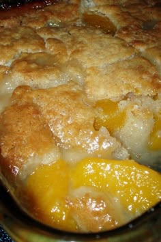 a close up of a casserole dish with oranges