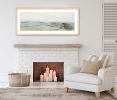 a living room with a fire place and white furniture in front of a painting on the wall