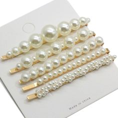 "Size:about 60mm length each hair clip. 5pcs different pearl hair clip in a card Shipment: *We ship the goods in 3-10 days after we get the payment. *Please check your address is full and correct. In order to have a exact and quickly, the better leave your Telephone No. We will send it by china post ordinary small packet. Shipping Time: Usually shipping time need about 25-40workdays .Sometimes may delay a few days to arrive; this is related to the two countries postal service efficiency, the lon White Pompom Hair Clip, Cute Cheap White Hair Accessories, Cheap Trendy White Hair Accessories, Pearls Hair, Crystal Garland, Bead Hair Accessories, Pearl Hair Clip, Headband Hair, Hair Beads