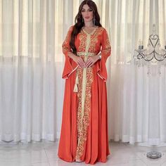 Orange Embroidered Floor-length Dress, Orange Long Sleeve Dress For Eid, Embroidered Orange Floor-length Dress, Bohemian Orange Dresses For Eid, Orange Long Sleeve Dress With Floral Embroidery, Orange Floor-length Dress For Eid, Long Orange Dress For Festive Occasion, Long Orange Dresses For Festive Occasions, Festive Long Orange Dress