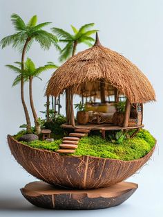 a small hut made out of grass and palm trees