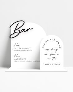 two white business cards with black ink on them and the word bar written in cursive writing