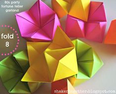 folded origami flowers with text overlay that reads fold 8 party fortune teller garland