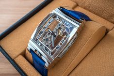 DESCRIPTION: This is a fine classic mechanical watch. It does not require battery. All the parts on this watch is beautifully crafted. Cool thing about this watch is that you can actually see through front to back, to sides and you can enjoy all the gears move inside the watch. Comes with quality gift box. COLOR: SILVER WITH BLUE GENUINE LEATHER BAND (20mm LINK) WATCH CASE SIZE: 32MM X 51MM DISPLAY: ANALOG CASE: STAINLESS STEEL MOVEMENT: MANUAL MECHANICAL WATER RESISTANCE RATING: 3ATM (30 METERS Blue Watch Accessories With Rectangular Dial For Gift, Blue Rectangular Dial Watch Accessories For Gift, Elegant Blue Skeleton Dial Watch, Rectangular Skeleton Dial Watch As A Gift, Rectangular Skeleton Dial Watch For Gift, Elegant Blue Rectangular Watch, Elegant Blue Watch With Skeleton Dial, Blue Rectangular Business Watches, Rectangular Blue Quartz Watches