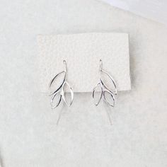 This leaf-like design of three beautiful marquis together is lovely and delicate. Sterling Silver 32x13mm Hypoallergenic Leaf-shaped Earrings, Dandelion Jewelry, Anthony Lent, Fine Gold Jewelry, Zoe Chicco, Gemstone Meanings, Jewelry Post, Stacked Jewelry, Fabric Beads