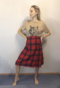 "Scottish Kilt Tartan Plaid Authentic Hot Red  Pure New Wool Wrap Skirt Accordion Pleated Size Large Made in Great Britain Label size: 16 Estimated size: L Measurements: Length: 28\" / 71 cm Waist (MIN): 14,5\"/ 37 cm  Waist (MAX): 15.5\"/ 40 cm  Please check measurements to insure a proper fit. Remember to allow yourself some extra room for movement. You can compare these with something from your closet that fits you well. This skirt will come to you freshly laundered and ready to wear. Please Red Scottish Style Fitted Bottoms, Fitted Scottish Pleated Skirt, Scottish Style Fitted Plaid Pleated Skirt, Tartan Skirts Midi, Red Tartan Fitted Bottoms, Vintage Tartan Skirt, Red Tartan Rara Skirt, Scottish Kilts, Wool Wrap