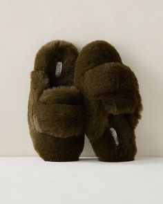 A timeless slipper silhouette in super soft faux fur on a soft, padded footbed. Pair them with your favorite off-duty look and slide into relaxation mode. If you typically wear a half-size, size down for a more comfortable fit. Details + Design: Slip on. Material: 100% PolyesterImported | Faux Fur Slippers Haven Well Within Faux Fur Slippers, Cute Sneakers, Fur Slippers, Fit Details, Daily Dose, Design Details, Relaxation, Faux Fur, Comfort Fit