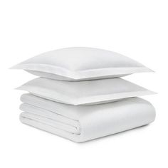 three pillows stacked on top of each other