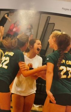 the girls volleyball team is celebrating their victory