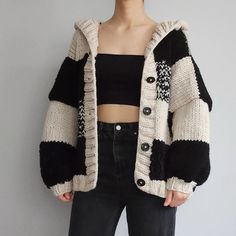 "IMPORTANT *Please don't forget to write your phone number for the shipping\" You can check our website for more information and discounts. We took a step further for our most-seller product and added a hood to our patchwork cardigan!  This drop shoulder cardigan has an oversized mold. Model is 53kg/116lb and 168cm/5'6\" and wears L/XL long oversized. Materials: 50% Wool, Acrylic and Polyamide. This item is hand-knitted and made to order. When you place an order it will be knitted and shipped in Crochet Hood Cardigan, Black Patchwork Sweater For Streetwear, Black Patchwork Cardigan For Winter, Winter Black Patchwork Cardigan, Black Cotton Hooded Cardigan, Black Hooded Cotton Cardigan, Cozy Cotton Sweater With Patchwork, Cozy Cotton Patchwork Sweater, Crochet Hooded Cardigan