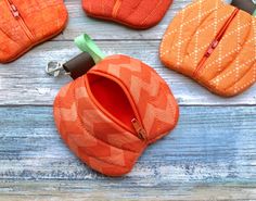 This listing is for one pumpkin zipper pouch. Each bag is fully lined with orange fabric. Size: 4x4 Knitting Notions, Zippered Bag, School Birthday, Small Pouch, Orange Fabric, Small Pouches, Zipper Bag, Chain Bag, Coin Purses