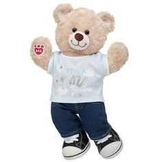 a brown teddy bear wearing jeans and a t - shirt