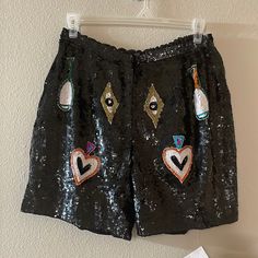 These Are So Fun! Right On Trend! Handmade In India Completely Sequined Throughout With Designs In The Front, Each Design Has A Hand Beaded Boarder Long Shorts A Little Stretch In The Back Hook And Eye Closure And Zipper Front Tag Says Size Small, See Measurements Below, All Measurements Taken While Garment Is Flat 14.5-15in Across The Waist 18in Long 7in Inseam Drop 11in Rise These May Be Vintage But I’m Unsure Nwt, But No Extra Sequin Pouch, Was Not There When I Purchased Embellished Party Shorts For Summer, Summer Party Embellished Shorts, Casual Party Shorts With Sequins, Casual Sequined Shorts For Party, Casual Black Sequined Bottoms, Black Sequin Shorts For Summer, Embellished Black Shorts, Chic Black Sequined Shorts, Grey Sweat Shorts