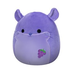 a purple stuffed animal with grapes on it's chest and eyes, sitting in front of a white background