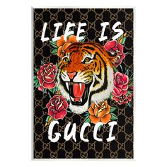 a tiger with roses on it's head and the words life is gucci