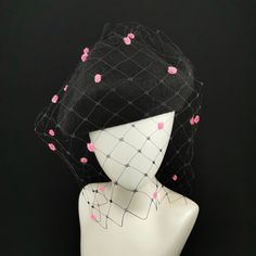 Black beret (50% Wool 50% Acrylic) with black veiling and neon pink chenille dots, individually hand applied.  The veiling is soft with very large diamonds, in the style of the 1940s veils.  The idea of the berets with veiling comes from my desire to have a special hat that I could put in a trolley for short trips or in my purse while I'm in town, without ruining it.  You can hide most of the veil under the beret for a more sober effect. I'm happy to send more information or detailed pictures, please ask! Kindly add a contact phone number upon check-out, especially in case of priority shipping, it's required in the shipping documents.  I'm happy to send more information or detailed pictures, please ask! Kindly add a contact phone number upon check-out, especially in case of priority shippi Black Cloche Fascinator For Races, Black Short Brim Headpiece For Spring, Black Winter Wedding Fascinator, Winter Wedding Black Fascinator, Black Cloche Hat For Church, Black Hats For Winter Races, Black Winter Hats For Races, Winter Black Hats For Races, Black Cloche Costume Hat For Church