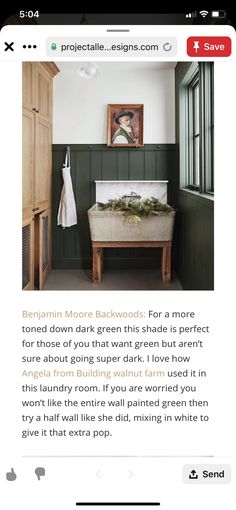 an image of a bathroom with green walls and wood paneling on the wall,