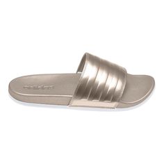 Whether you're lounging around or headed to the gym, slip into rewarding adidas comfort with these women's adilette Cloudfoam slide sandals.SANDAL FEATURESCloudfoam Plus contoured footbed that delivers plush cushioning with every stepClassic design features a bandage upper with contrast 3-StripesSANDAL CONSTRUCTIONSynthetic upperFoam midsoleRubber outsoleSANDAL DETAILSOpen toeSlip-onFoam footbed Size: 8. Color: Champagne Metallic. Gender: female. Age Group: adult. Adidas Sandals, Women Slides, Adidas Adilette, Color Champagne, Slides Sandals, Womens Slides, The Gym, Slide Sandals, Black Sandals