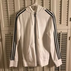 Authentic Adidas Zip Up Jacket With Tags. White Color With Black Stripes. Never Worn In Perfect Condition. Size Small. Please Check Out My Closet For Other Items Like This Message For Any Questions Or If You Would Like To Bundle! Adidas White Track Jacket With Three Stripes, White Long Sleeve Track Jacket With Three Stripes, White Three Stripes Long Sleeve Track Jacket, White Casual Track Jacket With Three Stripes, Casual White Track Jacket With Three Stripes, Adidas White Track Jacket For Fall, White Adidas Track Jacket For Winter, Adidas White Track Jacket For Winter, Adidas White Winter Track Jacket