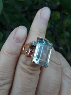 Absolutely Stunning 14k Yellow Gold, Huge Aquamarine, Ruby, Diamond Retro Ring... Aquamarine is approximately 18.15mm x 13.24mm, approximately 15ct. Perfect Vintage Pre Owned Condition.. Size is 7 1/4 Weight is .9 Grams Look Spectacular.. Ballerina Wedding, Retro Ring, Sapphire Wedding, Band Photos, Ruby Diamond, Cocktail Ring, Pink Sapphire, Cocktail Rings, Diamond Wedding