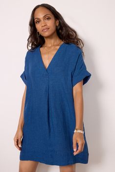 The Sanibel Basketweave Dress from Faherty is the ultimate barefoot summer dress, crafted in luxe linen, this dress features a v-neckline, rolled short sleeves, side pockets, and a relaxed oversized fit. Summer V-neck Relaxed Fit Dress, Spring V-neck Ramie Dress, Blue V-neck Dress For Summer Daywear, Summer Linen V-neck Dress, Chic V-neck Linen Beach Dress, Chic V-neck Linen Dress For Beach, Blue V-neck Dress For Daywear, Blue V-neck Summer Dress For Daywear, Blue V-neck Dress With Split Neck For Spring