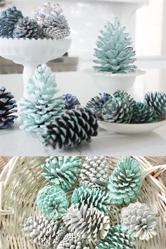 pine cones are arranged in white bowls with blue and green decorations on the top one