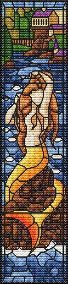 a stained glass window with an image of a dog in the water