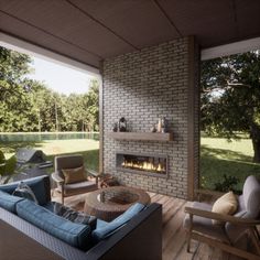 a living room with furniture and a fire place in the middle of an outdoor area