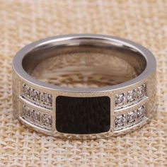 Our jewelry is not just metal, it is a piece of nature with millions of years of perfection to now enhance your look. Men's Ring Squared Onyx Diamonds Stainless Steel Enamel and Cubic Zirconia Comfort Fit Wedding Band Description: 1. Never Fades, Never Tarnishes, Never Discolors 2. 100% Brand New 3. Lasts Forever if Treated With Care Metals Type: Stainless steel Made in the USA – Controlled and Safe Labor Standards and Materials – Premium Quality - Better Customer Service from (USA) – Environmen Comfort Fit Wedding Band, Accessory Jewelry, Mens Accessories Jewelry, Men's Ring, Types Of Metal, Wedding Band, Labor, Onyx, Anniversary Gifts