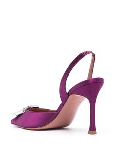 Step up your style game with these stunning satin pumps that add a pop of color to any outfit. You'll love the comfortable slip-on design and the way the crystals catch the light with every step. Perfect for a night out or adding a touch of glam to your everyday look. Amethyst purple calf leather with satin finish Pointed toe with crystal embellishment Branded footbed for added luxury Elasticated slingback strap Leather sole with a 90mm high stiletto heel Convenient slip-on style Includes a prot Purple Shoes, Satin Pumps, Amina Muaddi, Amethyst Purple, Crossbody Tote, Slingback Pump, Crystal Embellishment, Boot Sandals, Clutch Handbag