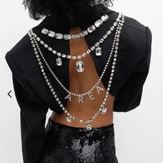 Logo Nameplate Crystal-Chain Open-Back Crop Blazer. Area Blazer, Surrealist Fashion, Pearl Jacket, Unusual Clothes, Chain Harness, Trending 2024, Diy Jacket, Fringe Leather Jacket, Clothing Design Sketches