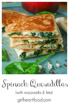 spinach quesadillas with mozzarella and feta on a blue plate