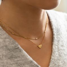 This elegant Gold Vermeil necklace features tiny hearts on a delicate diamond-cut cable chain. Pair it with other necklaces from this collection. Our patented connectors let you easily link and layer necklaces in any order you desire. Hearts width 0.11in(3mm) Adjustable chain: 15-18in(38-46cm) Gold Vermeil Spring clasp closure Hypoallergenic, lead and nickel free #112 Layer Necklaces, Heart Chain Necklace, Layered Chain Necklace, Layered Chain, Moms Bracelet, Choker Pendant, Studded Necklace, Gold Statement Ring, Nose Jewelry