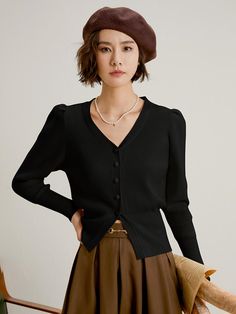 This is a feminine and romantic cardigan by LANGSON that is made out of high quality cotton wool, nylon, acrylic, and mohair blend fabric. With design detail of thick ribbing on cuffs and hem and high quality buttons on the front, it gives a trendy and feminine look.- Thick ribbed hem and cuffs for feminine silhouette- Front button closure- Feminine and modern mood Black Long Sleeve Cardigan With Button Cuffs, Elegant Black Winter Cardigan, Chic Black Sweater With Button Cuffs, Black Sweater With Button Cuffs For Winter, Black Winter Sweater With Button Cuffs, Elegant Black Spring Sweater, Elegant Winter Sweater With Button Closure, Black Formal Sweater With Button Closure, Formal Black Sweater With Button Closure