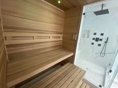 the inside of a sauna with wooden benches