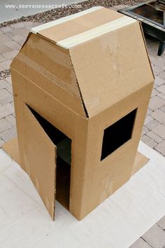 an open cardboard box sitting on top of a table