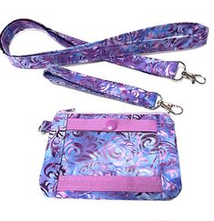 ♥♥ Lanyard:  Measures 1/2 Wide and Approximately 18 inch long without lobster claw. ♥♥ Wristlet: Measures: 1/2 Wide and Approximately 5 1/2 inches long without lobster claw. ID Zipper Pouch ♥♥  Measures long 6" Long x 4 1/2  Inch Tall. ♥♥  Comes with ID Window wallet with snap closer ♥♥  Made with 100% cotton fabric with a layer of interfacing to give it durability. Perfect for holding credit cards, keys, lip stick anything you need to grab and go! ♥♥  YKK  Zipper may vary in color, but will always coordinate.     ♥♥ Pattern placement may vary due to this being handmade and made to order.  ♥♥ ♥♥  All Item are made in a Smoke free pet free Studio Custom orders are always welcome! https://www.etsy.com/shop/GrandmasLittleLilly?ref=seller-platform-mcnav§ion_id=27045635 Purple Everyday Pouch Wristlet, Purple Rectangular Wristlet For Travel, Purple Pouch Wristlet For Everyday Use, Adjustable Wristlet With Cell Phone Pocket For Gifts, Purple Pouch Wristlet As Gift, Purple Pouch Wristlet Gift, Adjustable Rectangular Wristlet For Mobile Phone, Adjustable Rectangular Wristlet Mobile Phone Bag, Purple Rectangular Wristlet For Gift