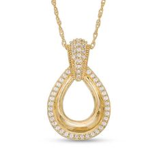 Dainty yet dazzling, this diamond pendant lends vintage-inspired style to her wardrobe. Crafted in warm 10K gold, this domed teardrop outline is framed in diamonds and suspends from a diamond-adorned and milgrain-detailed bail. Radiant with 1/8 ct. t.w. of diamonds and a brilliant buffed luster, this keepsake pendant suspends along an 18.0-inch rope chain that secures with a spring-ring clasp. Gold Pear-shaped Diamond Necklace With Accents, Classic Diamond Necklace With Teardrop Pendant And Diamond Accents, Classic Teardrop Diamond Necklace With Accents, Classic Teardrop Pendant Diamond Necklace With Accents, Gold Teardrop Diamond Necklace With Prong Setting, Yellow Gold Teardrop Diamond Necklace With Accents, Yellow Gold Diamond Necklace With Teardrop Pendant, Gold Teardrop Diamond Necklace With Rose Cut, Yellow Gold Diamond Necklace With Pear-shaped Accents