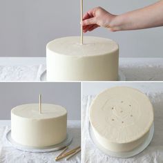 the cake is decorated with white frosting and has a wooden stick sticking out of it