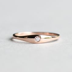 >Tapered diamond sets on 10k solid rose gold. >Solid 10k rose gold fully hallmarked. >Cut: Brilliant >2mm diamond >1.5mm band width All of our jewelry will arrive in custom packaging ready for gift giving. Custom sizes available, please message me. Other gemstones are available. LEAD TIME: Made to order will take 10-14 days. signature upon delivery, we unfortunately will not be able to reimburse or replace lost or stolen shipments. We do not accept returns on custom orders. Please 14k Rose Gold Stackable Promise Rings, 14k Rose Gold Stackable Rings With Single Diamond, Rose Gold 14k Gold Stackable Rings With Single Diamond, Promise Ring In Rose Gold With Single Diamond, 14k Rose Gold Stackable Rings With Brilliant Cut, Dainty 14k Rose Gold Diamond Ring For Anniversary, Rose Gold Promise Ring With Single Diamond, Delicate Rose Gold Diamond Promise Ring, Dainty Diamond Stackable Rings In Rose Gold