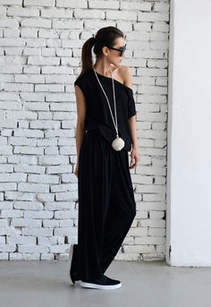 Black Loose Jumpsuit - METJ0003 When we think of warm weather, we think of jumpsuits - they are always in fashion, comfortable and easy to wear. The black color is classy and suits all skin tones.The loose part makes it perfect for a day walk in the city or a night out. You can pair it a lots of accessories and shoes. Jump in and lets party! The material is 100% viscose. WHEN YOU PLACE AN ORDER YOU MUST LEAVE A TELEPHONE NUMBER AND CORRECT COORDINATES! WE DO NOT TAKE RESPONSIBILITY FOR MISSING A Black Summer Jumpsuit, Summer Jumpsuit Casual, Wide Leg Pants Black, Loose Romper, Oversized Jumpsuit, Black Sleeveless Jumpsuit, Jumpsuit Wide Leg, Womens Jumpsuits, Maxi Jumpsuit