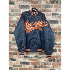 Step Onto The Baseball Field In Style With This Vintage 80s Park Avenue Long Island Tigers Baseball Bomber Varsity Jacket. The Royal Blue Jacket Features A Collared Design And Is Made From 100% Polyester, With A Polyester Lining For Added Comfort. The Jacket Has A Long Length And Is Available In Size Xl, With A Regular Fit. This Jacket Is Perfect For Those Who Love The 80s Theme And Want To Show Off Their Passion For Baseball. The Jacket Has A Retro Look And Is Perfect For Casual Wear. It Is Ideal For Those Who Want To Make A Statement While Staying Warm And Comfortable. The Jacket Is Perfect For Men Who Want To Showcase Their Love For Baseball While Looking Stylish. This Jacket Has Some S 90s Style College Outerwear For Fall, 90s Style Fall Outerwear For College, Throwback Long Sleeve Windbreaker For Fall, 90s Style Long Sleeve Outerwear For College, Fall Throwback Long Sleeve Windbreaker, Vintage Spring Outerwear For College, Royal Blue Jacket, Jacket Ideas, 80s Theme