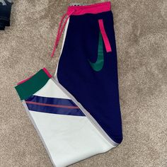 Brand New Never Worn! In Perfect Condition Still With Tags! Women’s Sizing! White Color Block Bottoms For Sports, Colorful Nike Sweatpants, Colored Nike Sweatpants, Nike Sweatpants Windbreaker, Nike Two Tone Sweatpants, White Color Block Sports Bottoms, Sporty White Color Block Pants, Blue Color Block Athleisure Bottoms, Sporty White Color Block Bottoms