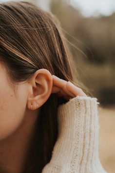 These earrings go into one piercing hole, but give you a double hoop look. They're hand hammered, giving them the prettiest texture. Perfectly minimalist, put them in and leave them in! There is no earring post to poke you in the back, really comfortable and no need to take them out while showering, sleeping, or exercising. Solid sterling silver and gold/rose fill, or solid gold for those of you with really sensitive ears! The smaller pair will work great for any piercings that are less than 7mm Small Earlobe Piercings, Double Earrings, Earring Hole, Double Hoop Earrings, Earring Post, Earring Sale, Rose Gold Earrings, Sensitive Ears, Small Designs