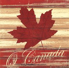 a wooden sign with a leaf on it that says canada and the word coca - cola