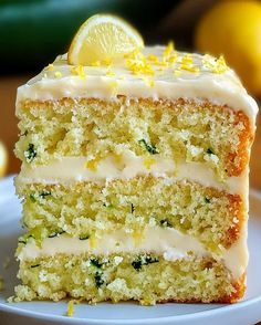 a slice of lemon cake on a white plate