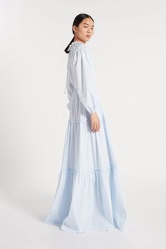 Long pale blue and white fine stripe cotton dress with built in slip. Ruffled tie neck, ruffled sleeve detail with elastic cuff, open back and tiered. Gathered skirt. Light Blue Ruffled Maxi Dress For Daywear, Duchess Satin, Silk Taffeta, Couture Details, Gathered Skirt, Circle Skirt, Funnel Neck, Tie Neck, Sleeve Detail