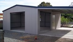 two garages with one door open and the other closed